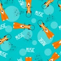 Cute cartoon fox enjoys music in headphones. Seamless patternl