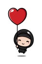 Cute cartoon girl character wearing Muslim costume with a flying veil with a heart-shaped balloon Royalty Free Stock Photo