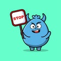 Cute Cartoon goblin monster with stop sign board