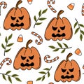 Cute cartoon halloween seamless vector pattern background illustration with pumpkins, candy corn and leaves Royalty Free Stock Photo