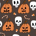 Cute cartoon halloween seamless vector pattern background illustration with pumpkins, candies and skulls Royalty Free Stock Photo