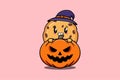 Cute cartoon biscuit hiding in pumpkin halloween Royalty Free Stock Photo