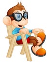 Cute cartoon monkey relaxing on the chair Royalty Free Stock Photo