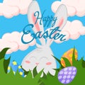 Cute cartoon rabbit hides in the grass to find eggs for easter Royalty Free Stock Photo