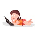 Cute cartoon toddler girl lying on the floor and playing using laptop colorful character Illustration