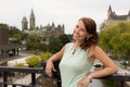 Cute casual young woman smiles in downtown Ottawa, Canada