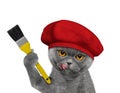 Cute cat as a painter with a brush. Isolated on white Royalty Free Stock Photo