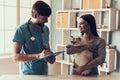 Cute Cat with Owner in Veterinarian Clinic