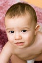 Cute caucasian baby on the carpet