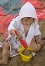 Girl. Beach. Toys. Sand. Summer. Towel. Cute Royalty Free Stock Photo