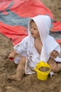 Girl. Beach. Toys. Summer. Sand. Towel. Cute Royalty Free Stock Photo