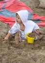 Girl. Toys Beach. Sand. Summer. Towel. Cute Royalty Free Stock Photo