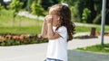 Cute caucasian baby, little girl crying on the playground in the park. Sad emotion of a child Royalty Free Stock Photo
