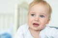 Cute caucasian blond toddler boy portrait crying at home during hysterics. Little child feeling sad. Small pensive baby after Royalty Free Stock Photo