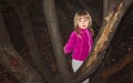 Cute girl playing in a forest Royalty Free Stock Photo