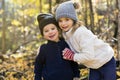 Cute caucasian kids on fall season outdoors Royalty Free Stock Photo