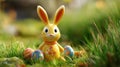 Cute ceramic Easter bunny figurine surrounded by colorful painted eggs on green grass in a bright outdoor spring setting, Royalty Free Stock Photo