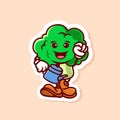 cute character of broccoli watering