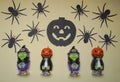 Cute characters in monster costume. Scary Halloween figurines stand on a light background close-up Royalty Free Stock Photo