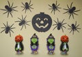 Cute characters in monster costume. Scary Halloween figurines stand on a light background close-up Royalty Free Stock Photo