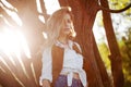 Cute charming girl in summer in the field. Young woman is happy and feels free outdoors Royalty Free Stock Photo