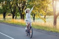 Cute Girl Playing Fool While Riding Bicycle