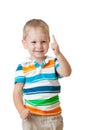 Cute cheerful kid boy with finger up