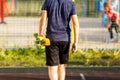 Cute cheerful smiling Boy in blue t shirt sneakers riding on yellow skateboard. Active urban lifestyle of youth, training, hobby, Royalty Free Stock Photo