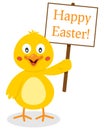 A Cute Chick Holding Happy Easter Sign Royalty Free Stock Photo