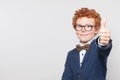 Cute child boy with thumb up on white background Royalty Free Stock Photo