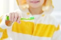 Cute child brushing teeth. Preschooler boy using toothbrush toothpaste and in bathroom during morning routine. Baby learning brush Royalty Free Stock Photo