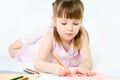 Cute child draw with colorful crayons and smile Royalty Free Stock Photo