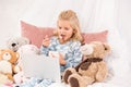 Cute child eating cornflakes and watching cartoons Royalty Free Stock Photo