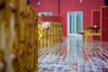 Cute child, enjoying little fishing village with rorbuer cabins on a heavy rainy day