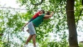 Cute child and father, boy and dad, climbing in a rope playground structure Royalty Free Stock Photo