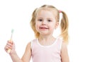 Kid girl brushing teeth isolated Royalty Free Stock Photo