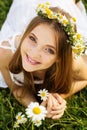 Cute child girl at camomile field Royalty Free Stock Photo