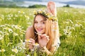 Cute child girl at camomile field Royalty Free Stock Photo