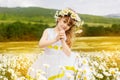 Cute child girl at camomile field Royalty Free Stock Photo