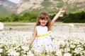 Cute child girl at camomile field Royalty Free Stock Photo