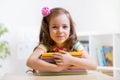 Cute child girl preschooler with books Royalty Free Stock Photo