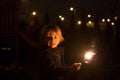 Cute child, holding sparkler at new year eve in garden Royalty Free Stock Photo