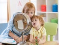 Cute child little boy at speech therapist lesson Royalty Free Stock Photo