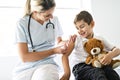 A cute Child Patient Visiting Doctor`s Office Royalty Free Stock Photo