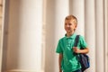 Cute child with rucksack go to school. Boy with backpak Royalty Free Stock Photo