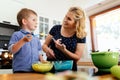 Cute child tasting cookie ingredients