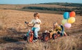 Cute children with balloons. Happy. Portrait of a happy children. Only fun is on my mind. Walk on countryside.