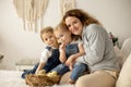 Cute children, boy and girl siblings at home with little newborn chicks, enjoying, cute kid and animal friend in sunny room Royalty Free Stock Photo