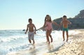 Cute children enjoying sunny day at beach. Summer camp Royalty Free Stock Photo