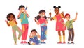 Cute Children Group with Dye Spots on Clothes, Face and Hands. Happy Kids Holding Brushes, Palette and Pencils Royalty Free Stock Photo